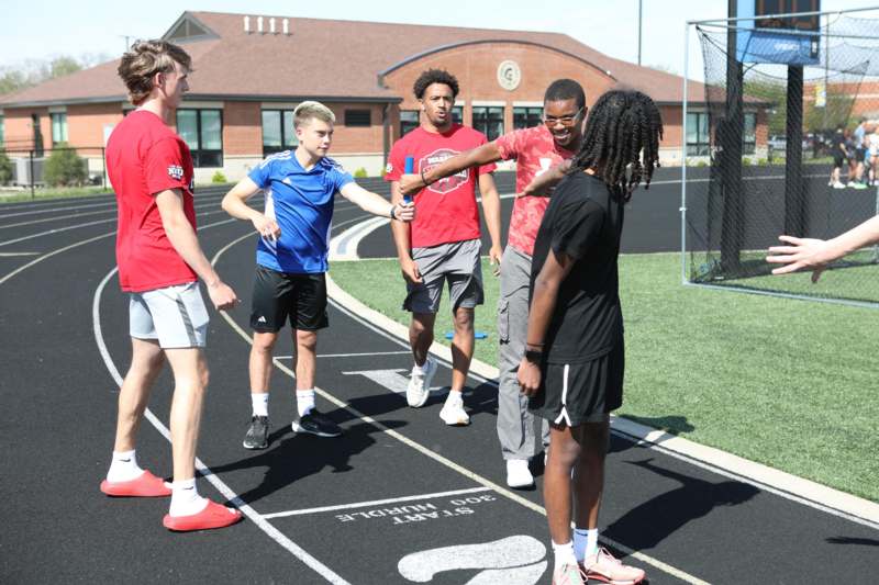 a group of men on a track