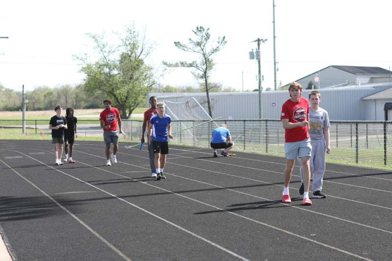a group of people on a track