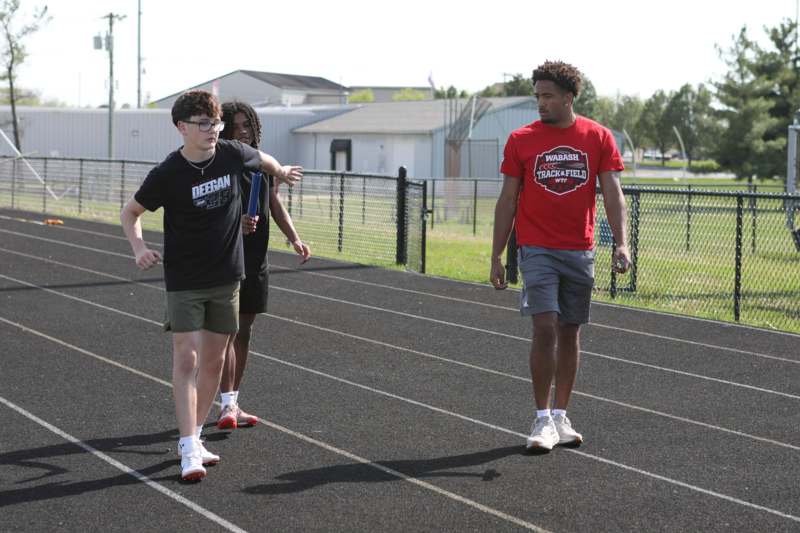 a group of people on a track