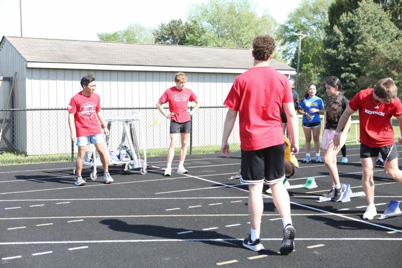 a group of people on a track