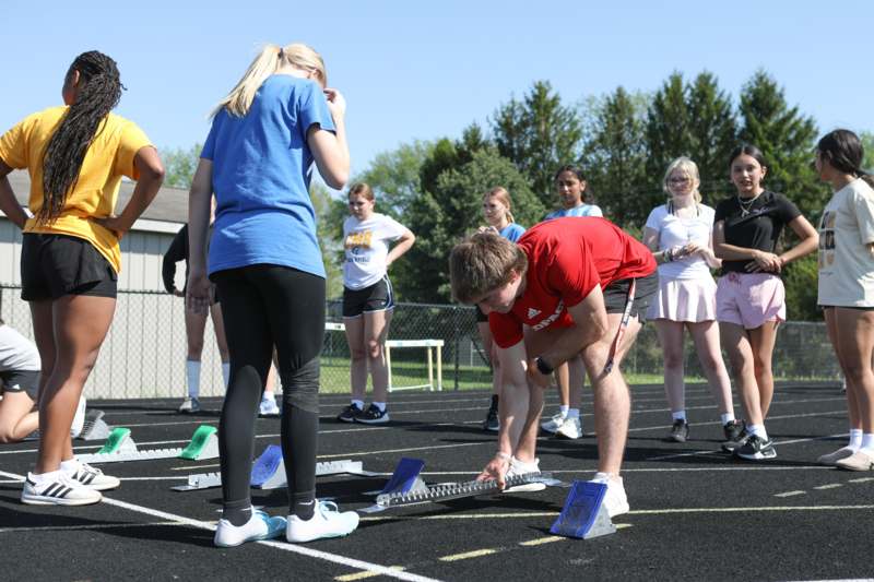 a group of people on a track