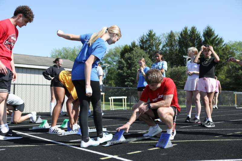 a group of people on a track