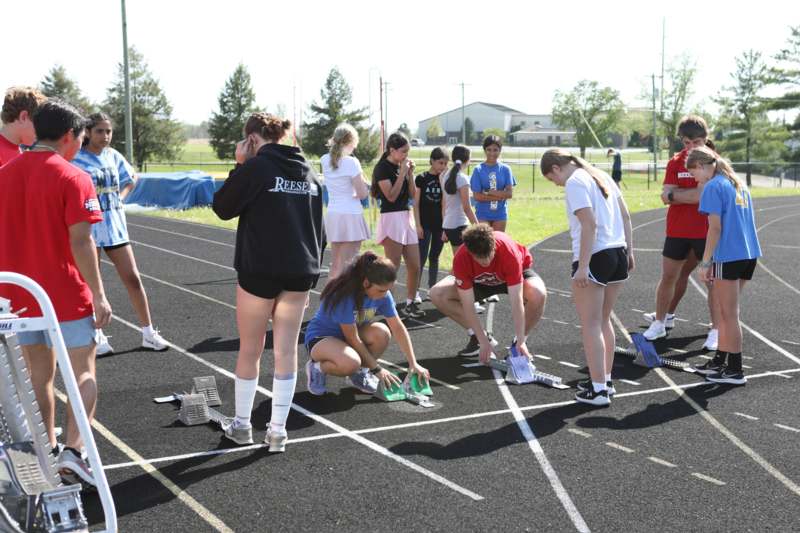 a group of people on a track