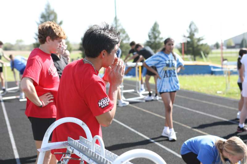 a group of people on a track