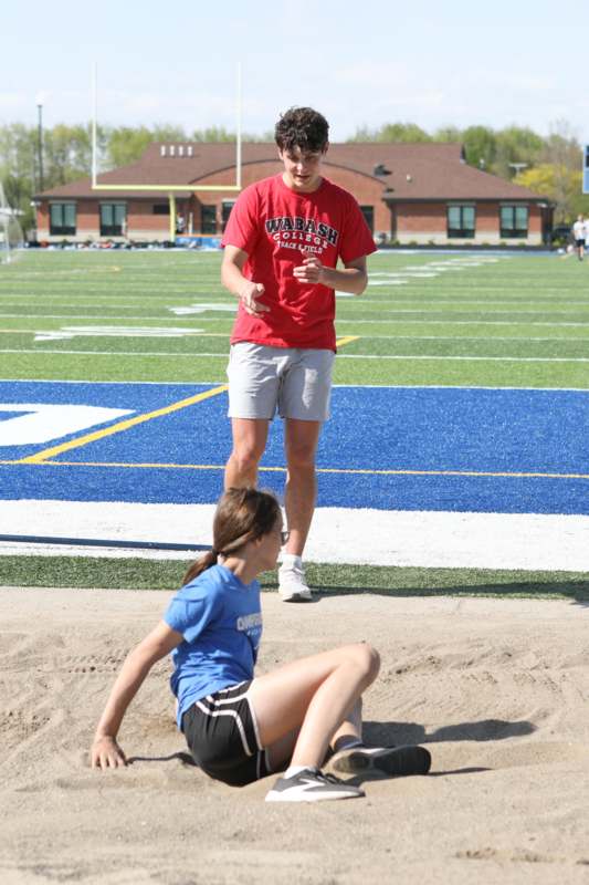 a man and woman on a field