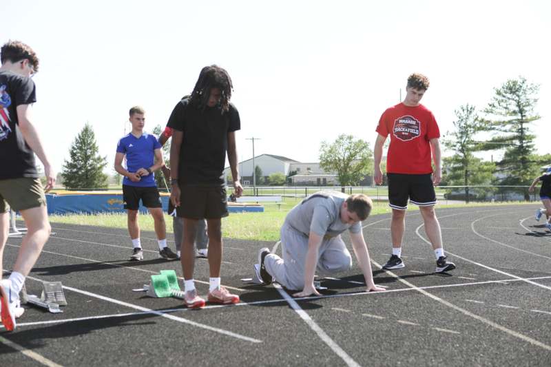 a group of people on a track