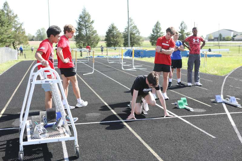 a group of people on a track