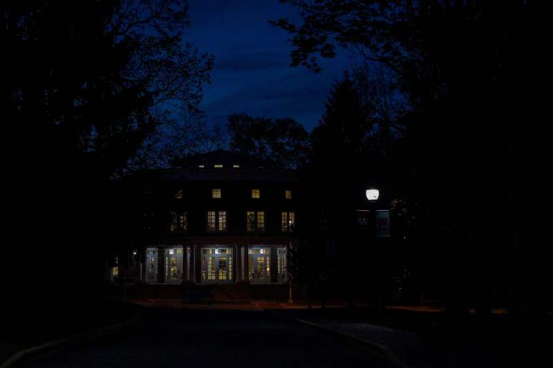 a building with many windows at night