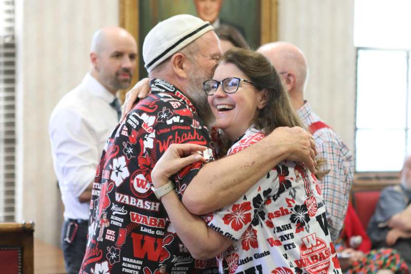a man and woman hugging