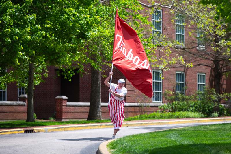 a person holding a flag