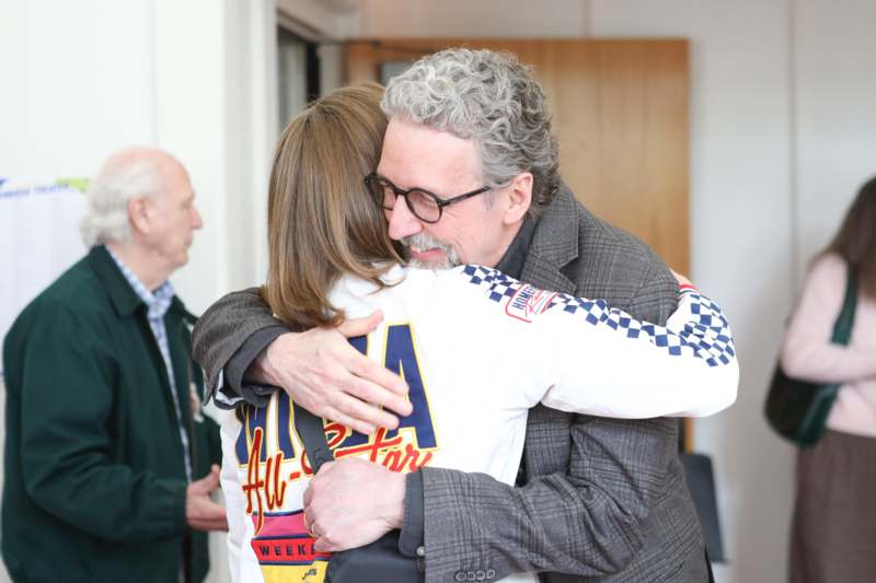 a man and woman hugging