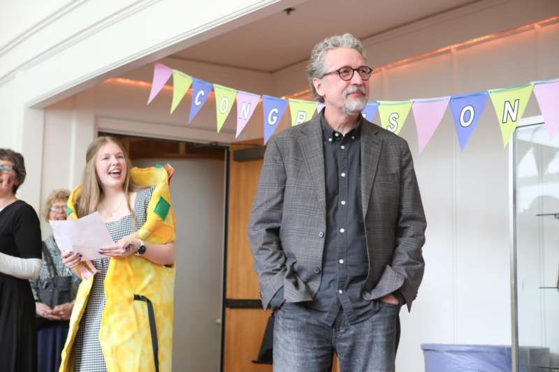 a man and woman standing in a room