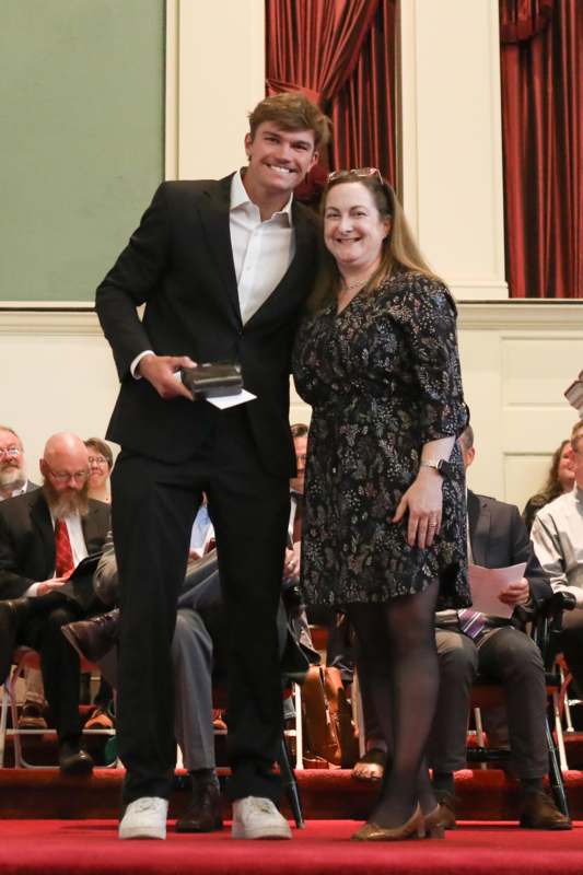 a man and woman standing together