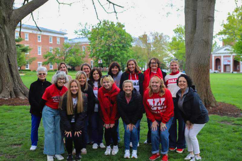 a group of women posing for a photo