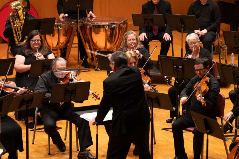 a group of people playing instruments