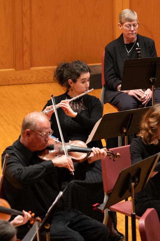 a group of people playing instruments