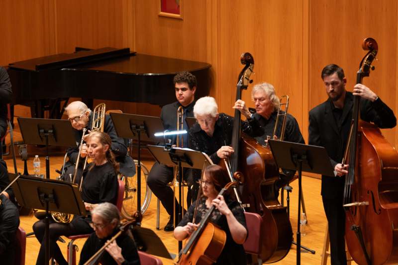 a group of people playing instruments