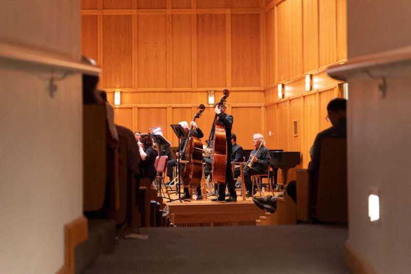 a group of people playing instruments