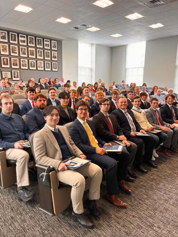 a group of people sitting in a room