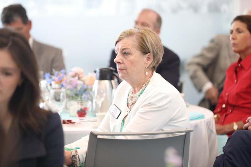 a woman sitting at a table