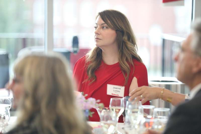 a woman in a red shirt