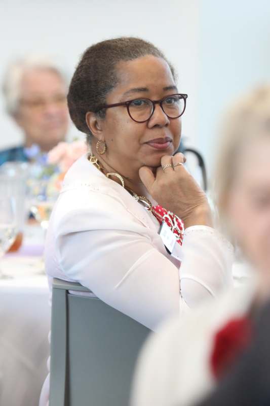 a woman sitting at a table