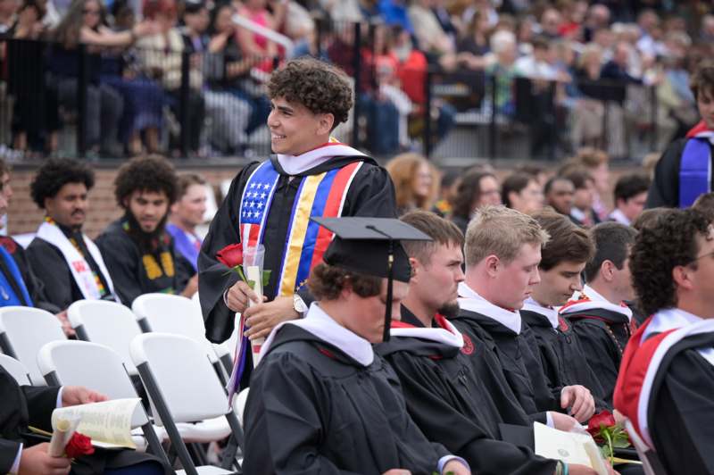a group of people in graduation gowns
