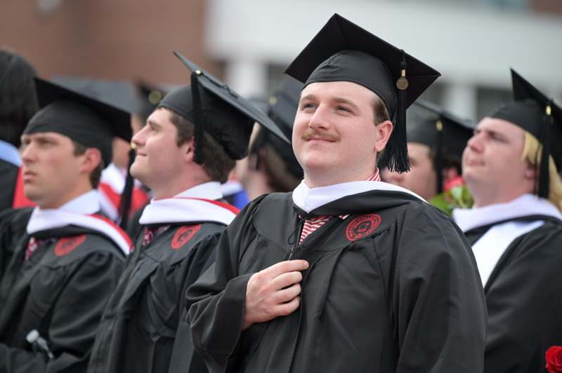 a group of people wearing graduation gowns