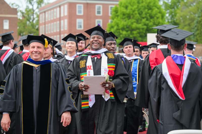 2026 Commencement Album 3 - a group of people in graduation gowns