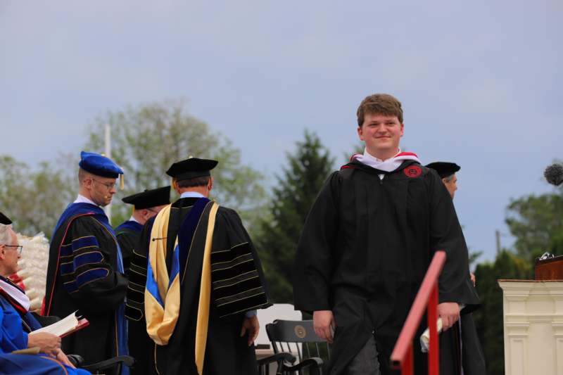 a group of people wearing graduation gowns