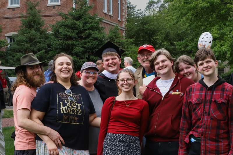 a group of people posing for a photo
