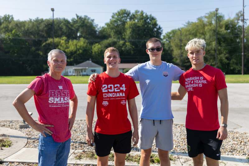 a group of men posing for a picture
