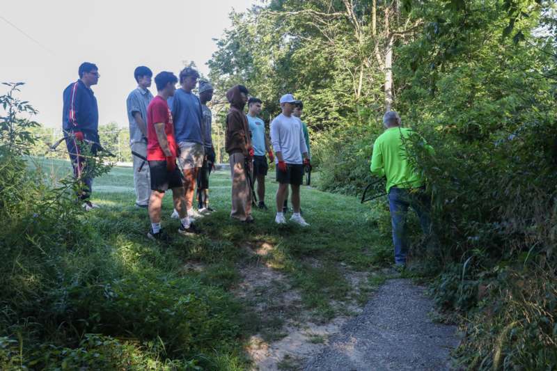 a group of people standing in a line