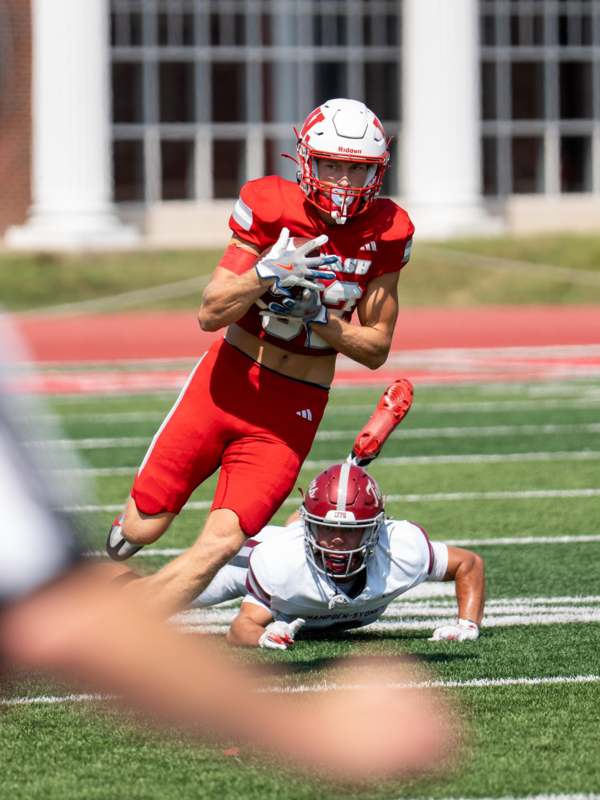 a football player running on the field