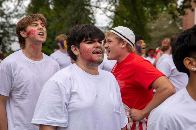 a group of people with paint on their faces
