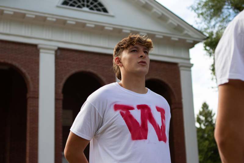 a man standing outside a building