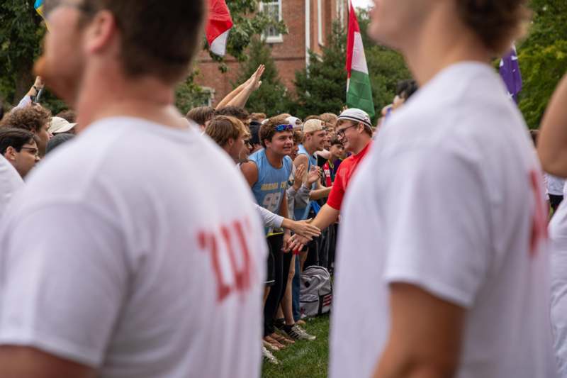 a group of people shaking hands