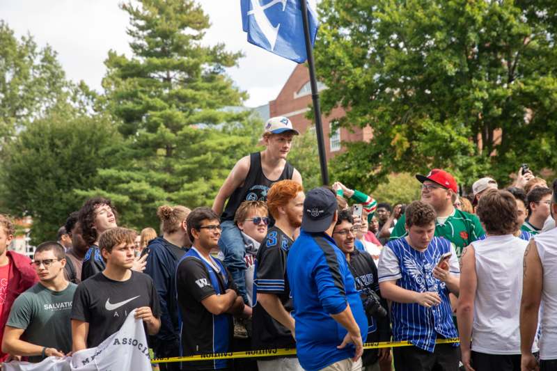 a group of people standing in a line