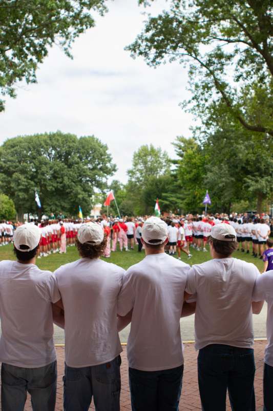 a group of people standing in a line