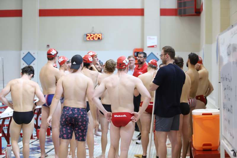a group of people in swimsuits