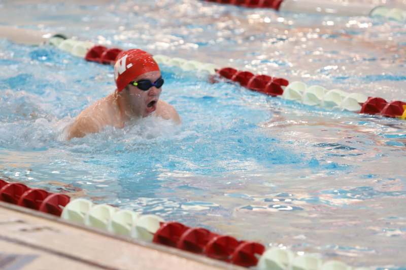 a man in a swimming pool