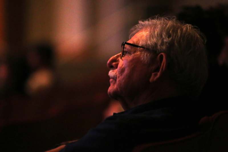 a man looking up at something