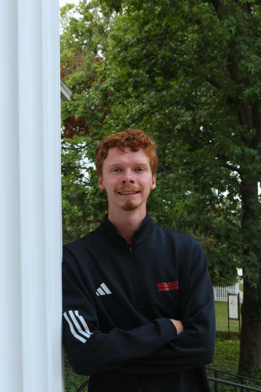 a man with red hair and a goatee