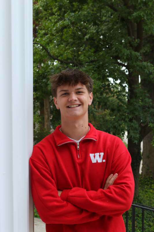 a man in a red jacket