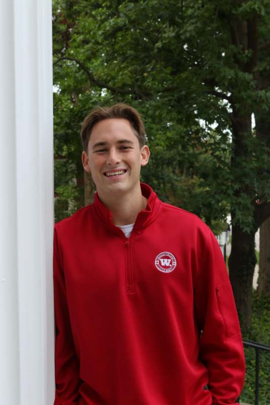 a man in a red jacket