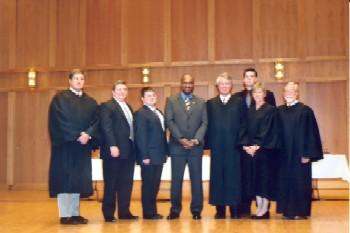 a group of people standing in a court