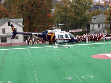 a helicopter on a football field