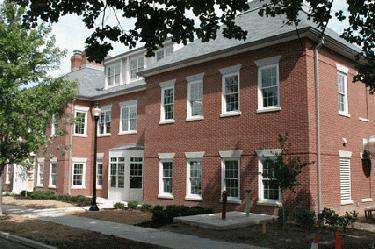 a brick building with white trim