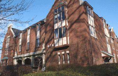 a brick building with many windows